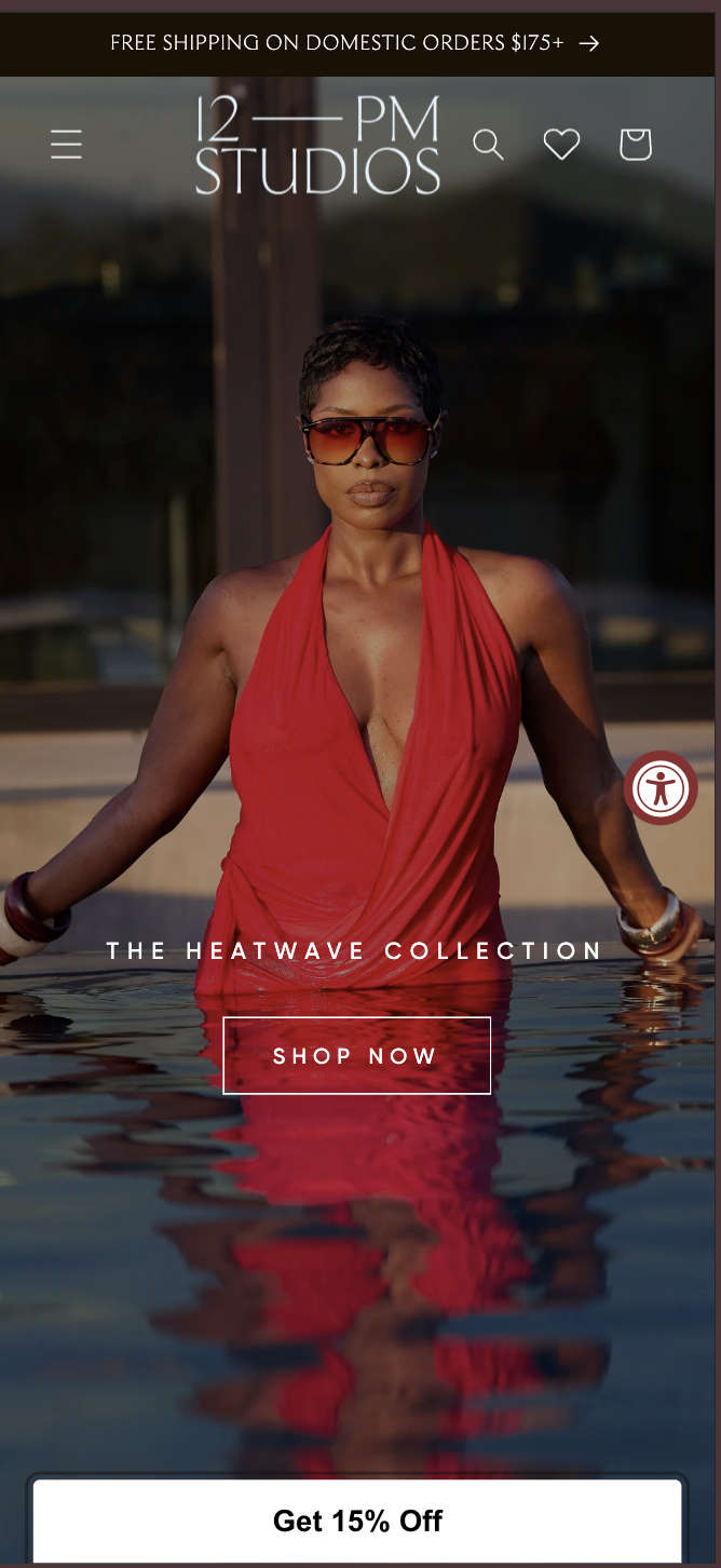 12PM Studios homepage on mobile, with the Heatwave Collection hero text placed below the model
